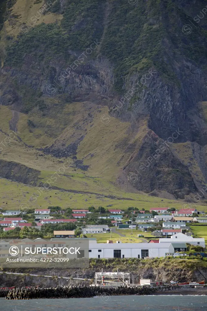 Tristan Da Cunha Island, settlement capital of Edinburgh viewed from the sea dominated by the foothills of the Queen Mary Volano.