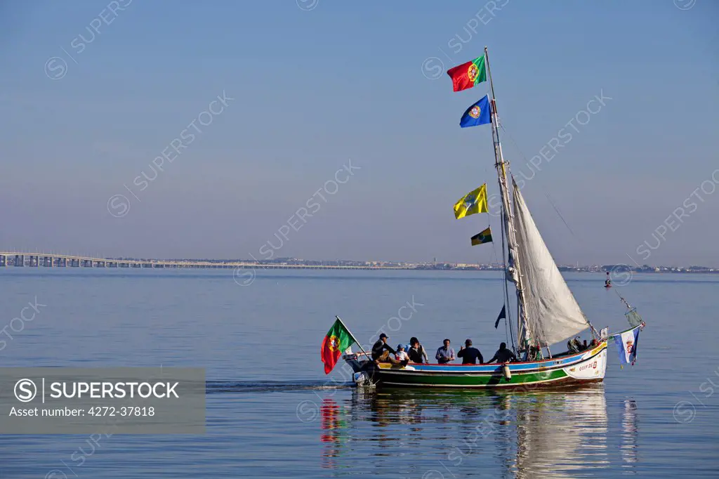 Traditional boat at river Tagus, Lisbon, Portugal