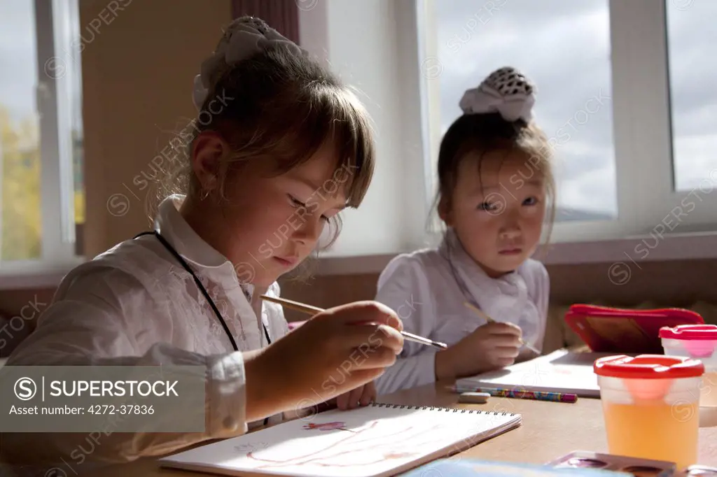 Sakhalin, Yuzhno-Sakhalinsk, Russia; Childen during their drawing class in Gimnasia no3, the art college for talented childen in the capital of Sakhalin