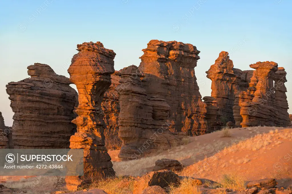 Chad, Abaike, Ennedi, Sahara. Red Palaeozoic sandstone sculptured by nature into spectacular landforms over thousands of years.