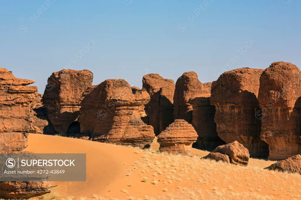 Chad, Abaike, Ennedi, Sahara. Red Palaeozoic sandstone sculptured by nature into spectacular landforms over thousands of years.