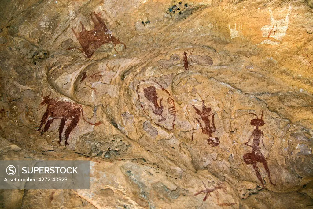 Chad, Tchad, Terkei West, Ennedi, Sahara.  Ancient rock art painted on the domed ceiling of a small cave or shelter.