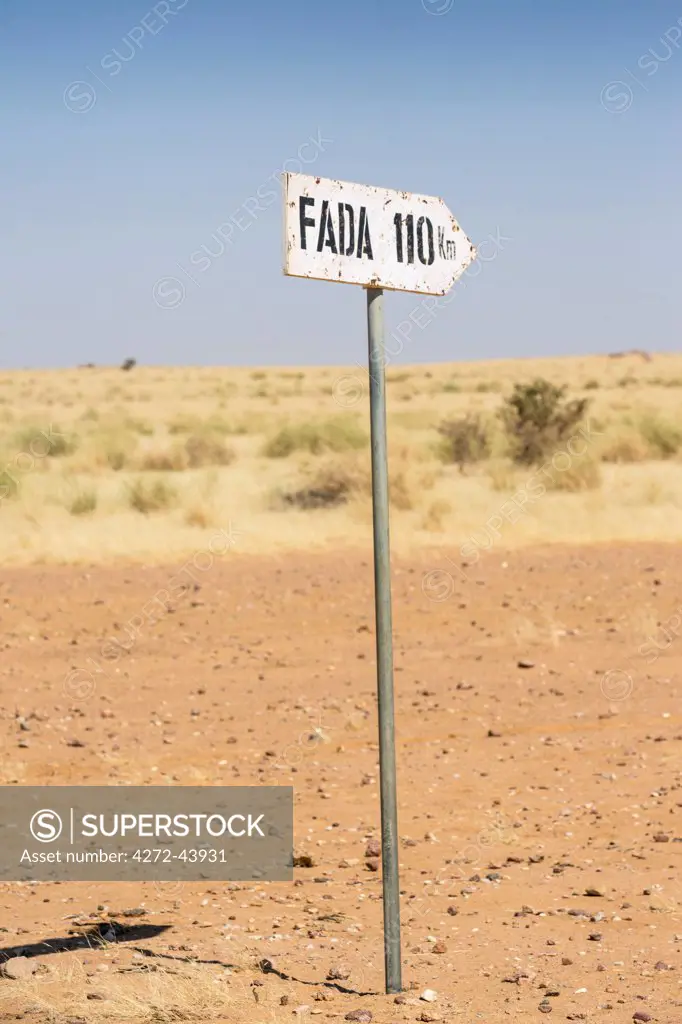 Chad, Kalait, Ennedi, Sahara.  A road sign between Kalait and Fada. Fada is a town of northeast Chad with an old French colonial fort.