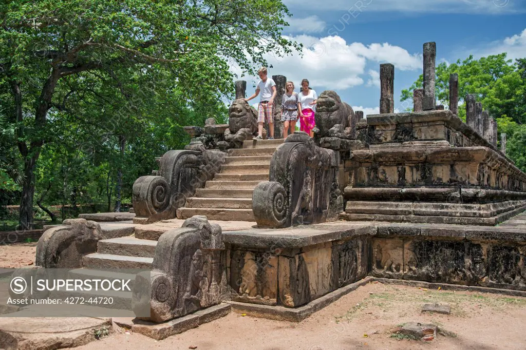 Tourists visit Raja Vaishyabhujanga Mandapa, the council chamber of King Parakramabahu the Great 1153 1186 AD, Polonnaruwa, Sri Lanka