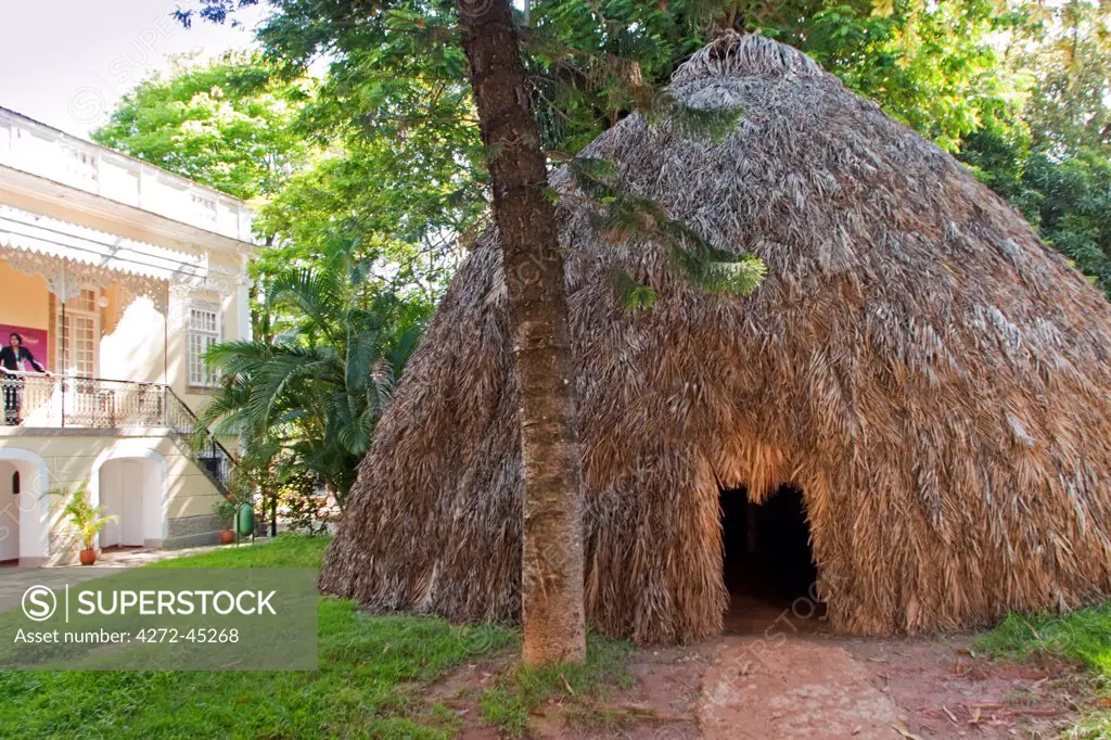 South America, Brazil, Rio de Janeiro, a maloca, indigenous round house, in the garden of the Indigenous Peoples Museum in Botafogo