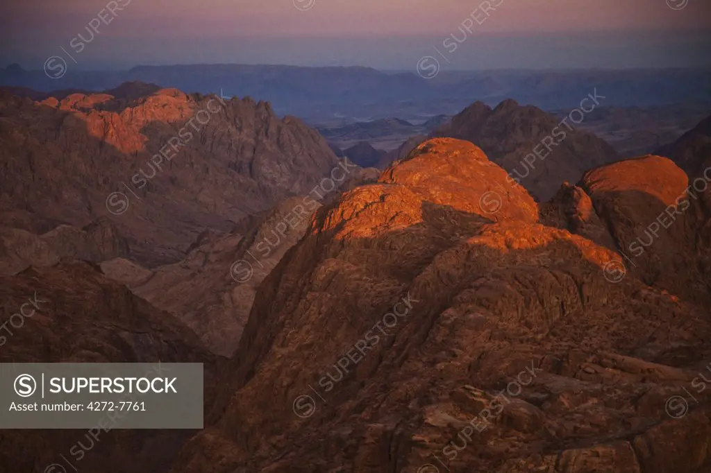 Egypt, Sinai Peninsula, Janub Sina Uqrat Safah, panormaic view of the Sinai desert at sunrise from the top of Mount Sinai