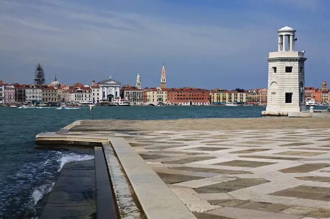 Italy, Veneto, Venezia, Sestiere di San Marco, San Giorgio Maggiore, panoramic view of Venice seen from the dock and marina of San Giorgio Maggiore Island.