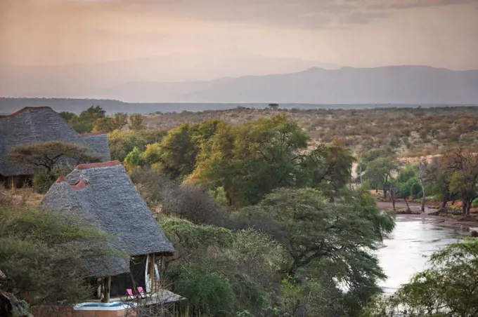 Kenya, In the early morning, Mount Kenya rises in the far distance from luxurious Sasaab Lodge situated on the banks of the Uaso Nyiru River in Northern Kenya.