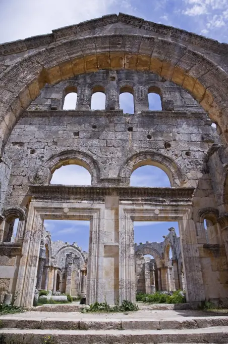 The ruins of the Basilica of St Simeon Stylites the Elder in the hills near Aleppo. St Simeon stood on top of a pillar for 30 years until his death in 459AD. The Basilica was built around the pillar, the remains of which can still be seen.