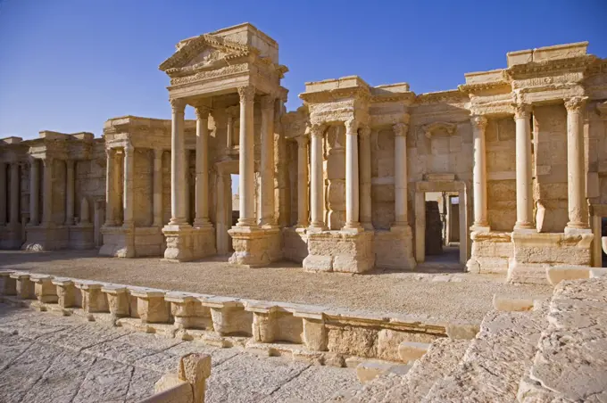 The theatre in the spectacular ruined city of Palmyra, Syria. The city was at its height in the 3rd century AD but fell into decline when the Romans captured Queen Zenobia after she declared independence from Rome in 271.