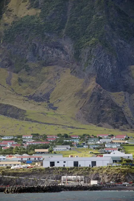 Tristan Da Cunha Island, settlement capital of Edinburgh viewed from the sea dominated by the foothills of the Queen Mary Volano.