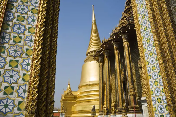 Thailand, Bangkok.  Temple architecture at Wat Phra Kaew (Temple of the Emerald Buddha).