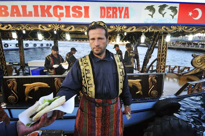 Fast food Turkish style, mackerel seller on the waterfront at Eminonu, Istanbul, Turkey