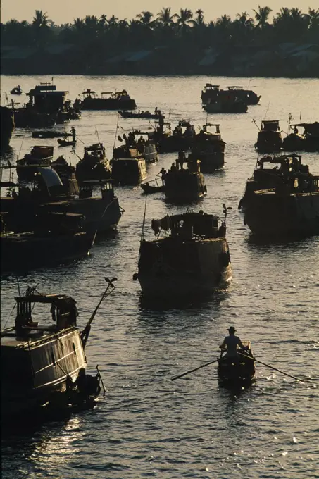 Trade Boats at the floating market on the Mekong River, near the town of Cantho.