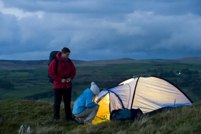 Gilar Farm, Snowdonia, North Wales.  Man and woman camping in the wild. (MR)