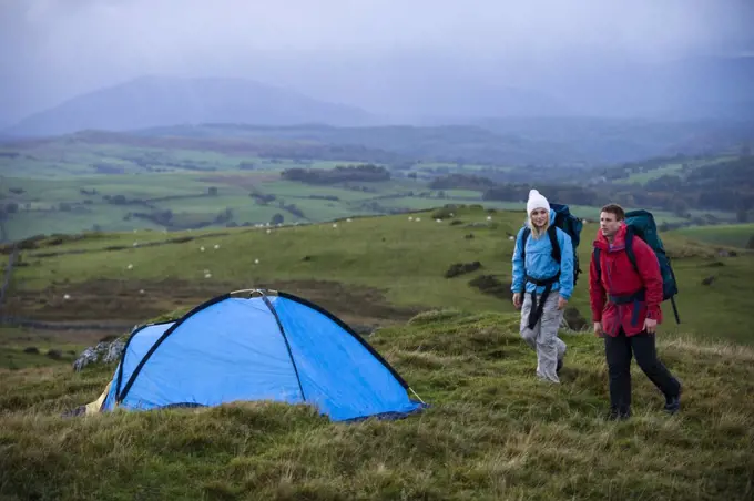 Gilar Farm, Snowdonia, North Wales.  Man and woman camping in the wild. (MR)