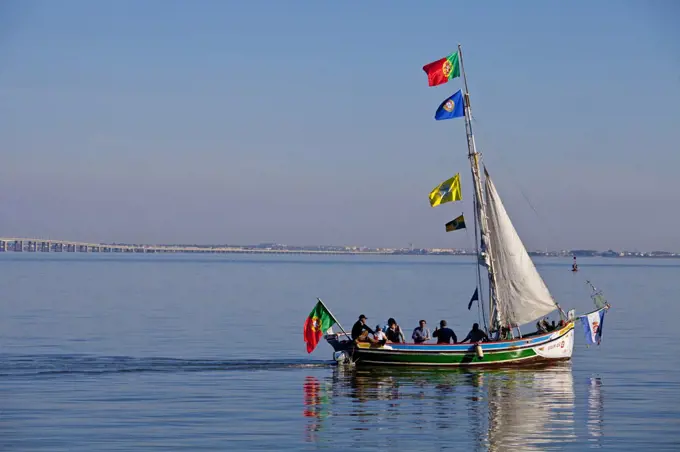 Traditional boat at river Tagus, Lisbon, Portugal