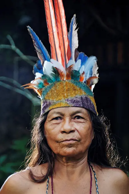 Indian woman with head dress, Ticuna Indian Village of Macedonia, Amazon River, near Puerto Narino, Colombia