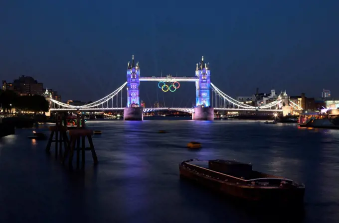 Londons famous Tower Bridge with the Olympic Rings at dusk.