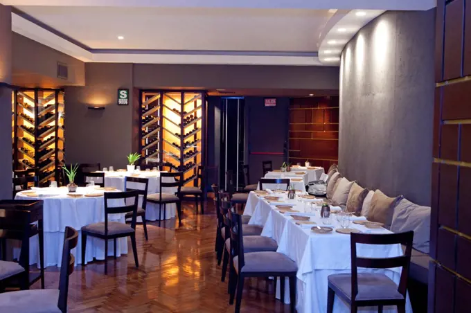 South America, Peru, Lima, San Ignacio.  The dining room at the Malabar restaurant run by chef Pedro Miguel Schiaffino, PR,