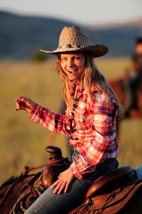 Tourist girl from Switzerland at Wilson Ranch, Guest Ranch and B&B, Fossil, Oregon, USA MR