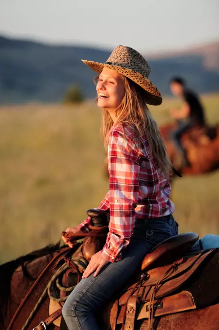 Tourist girl from Switzerland at Wilson Ranch, Guest Ranch and B&B, Fossil, Oregon, USA MR