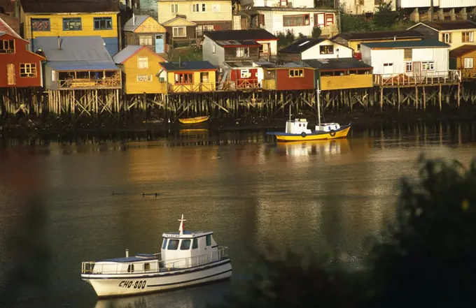 Chile, Region X. Traditional shingled houses, Palifitos, Castro, Island of Chiloe, Southern Chile.