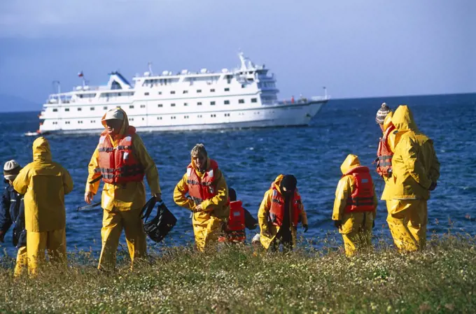 Chile, Tierra del Fuego. Passengers from the cruise ship, Terra Australis on a seven day trip through the islands of Tierra del Fuego from Punta Arenas, Region XII, Southern Chile