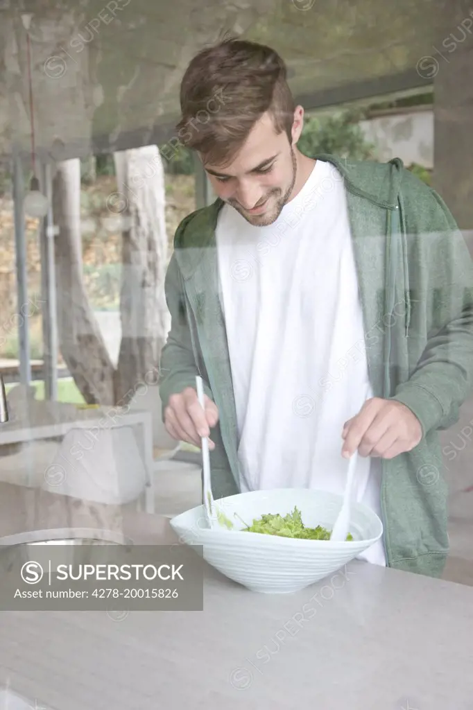 Man Tossing Salad