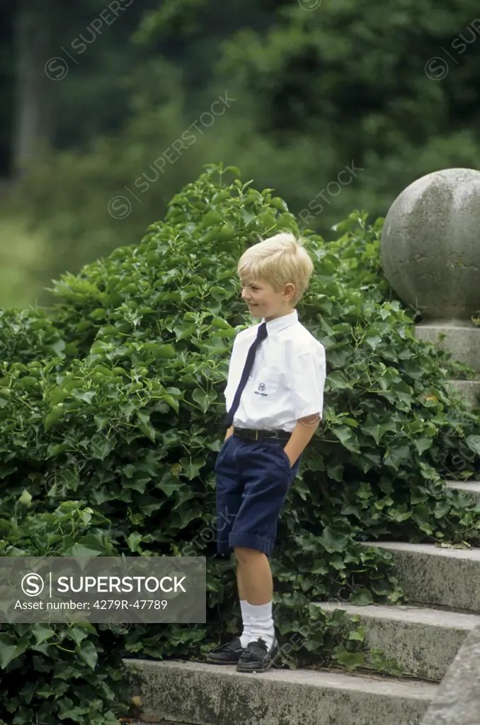 boy - standing on stairs