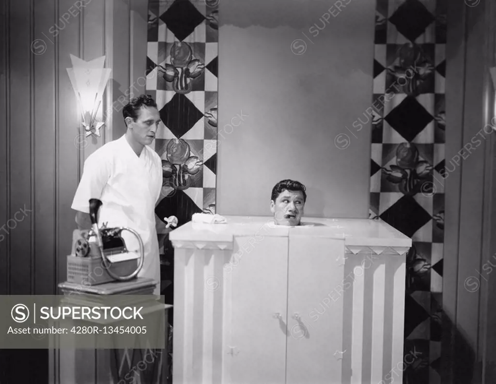 Man in steam bath with assistant and dictaphone All persons depicted are not longer living and no estate exists Supplier warranties that there will be...