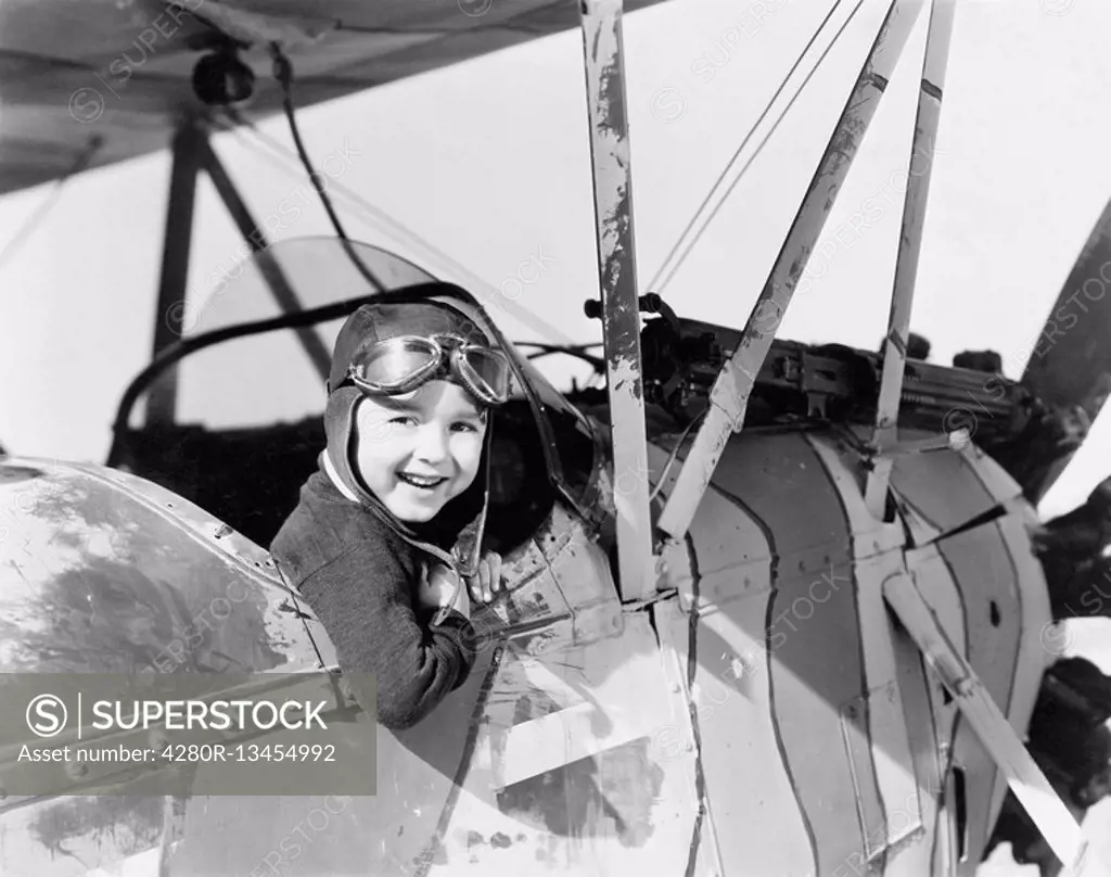 Little boy in cockpit of plane All persons depicted are not longer living and no estate exists Supplier warranties that there will be no model release...