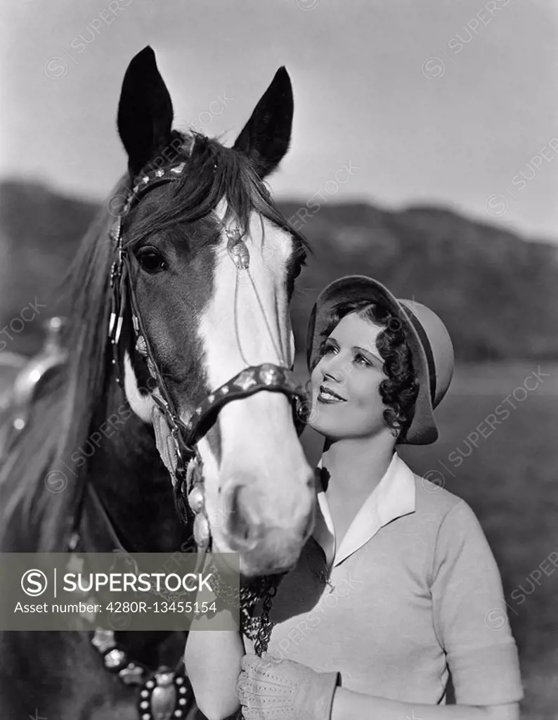 Portrait of woman with horse All persons depicted are not longer living and no estate exists Supplier warranties that there will be no model release i...