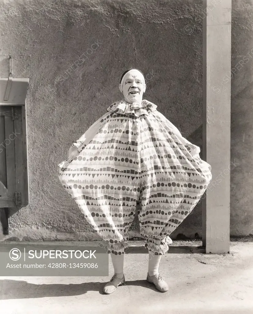 Clown wearing wide costume