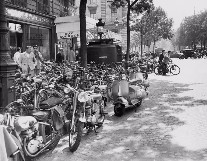 Street scene in Paris, August 23, 1953 All persons depicted are not longer living and no estate exists Supplier warranties that there will be no model...