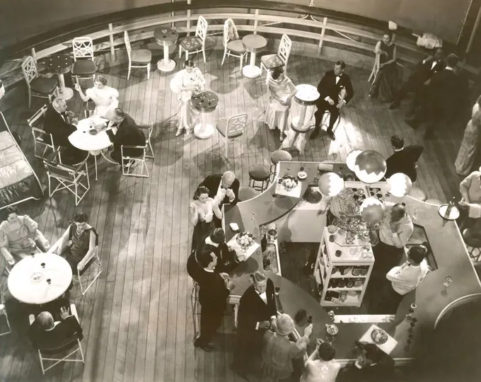 High angle view of people at cocktail lounge aboard ship (OLVI007_OU555_F)