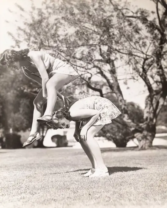 Playing leap frog (OLVI007_OU749_F)