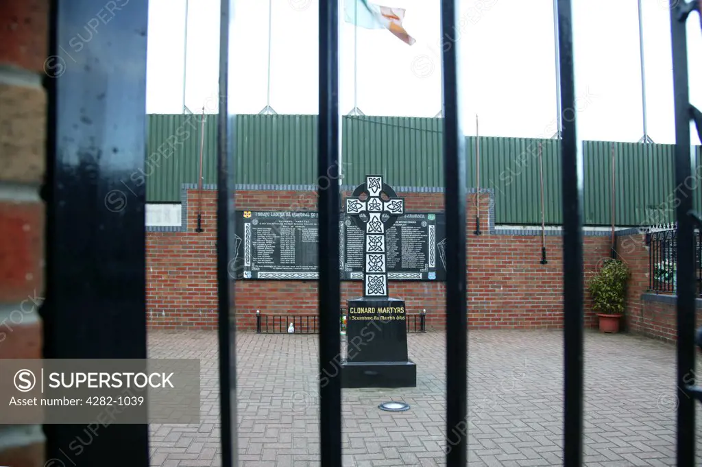 Northern Ireland, Belfast, Bombay Street. A view through the fence to the Clonard Martyrs memorial garden in Belfast.