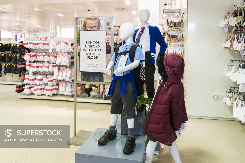 Clothing on display and for sale in a Marks and Spencer store.