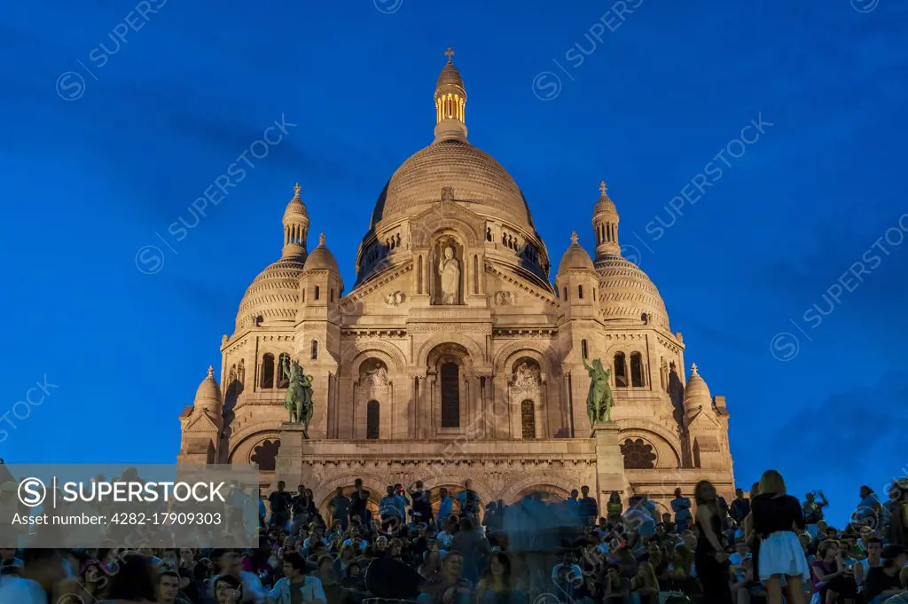 Sacre Coeur Basilica at night at Montmartre in Paris.