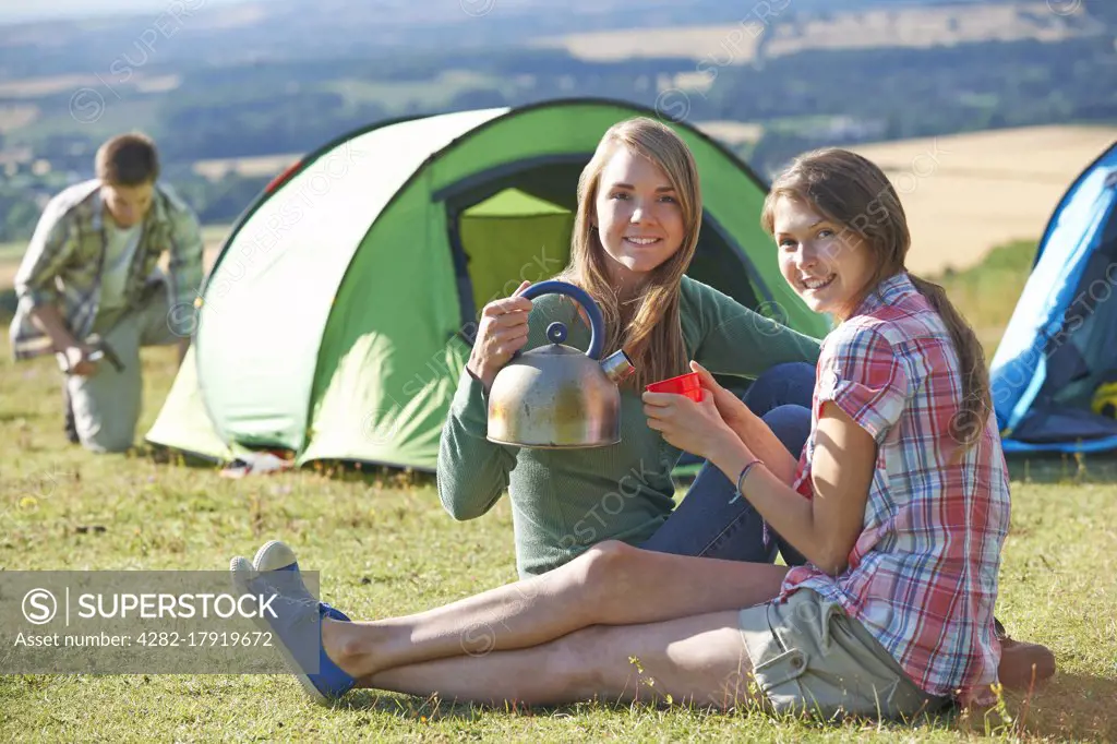 Group Of Young Friends Camping In Countryside