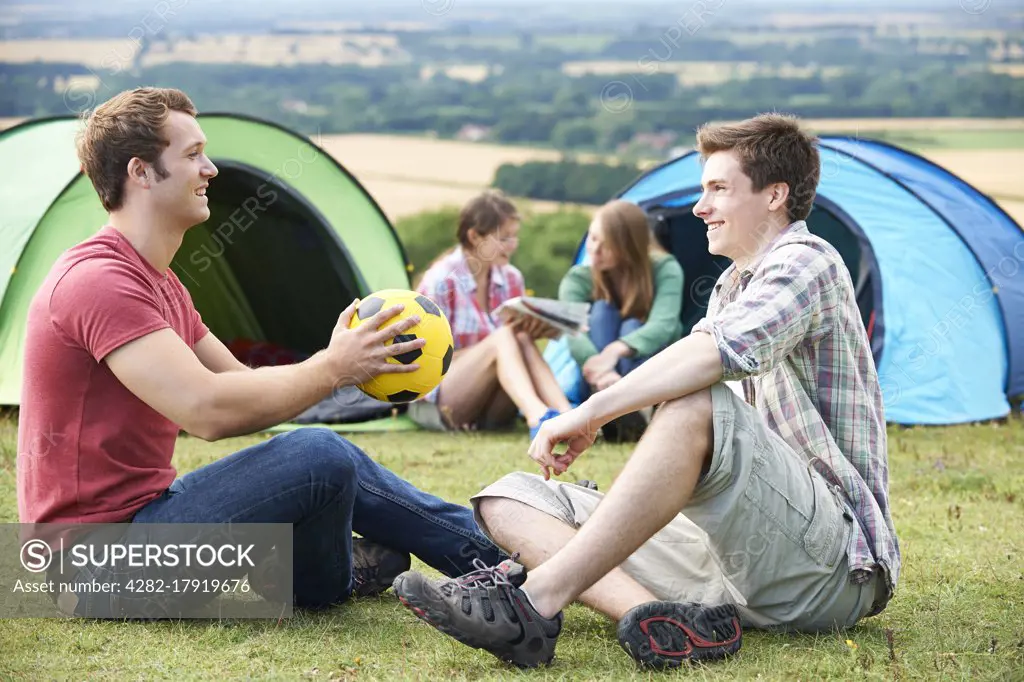 Group Of Young Friends Camping In the Countryside