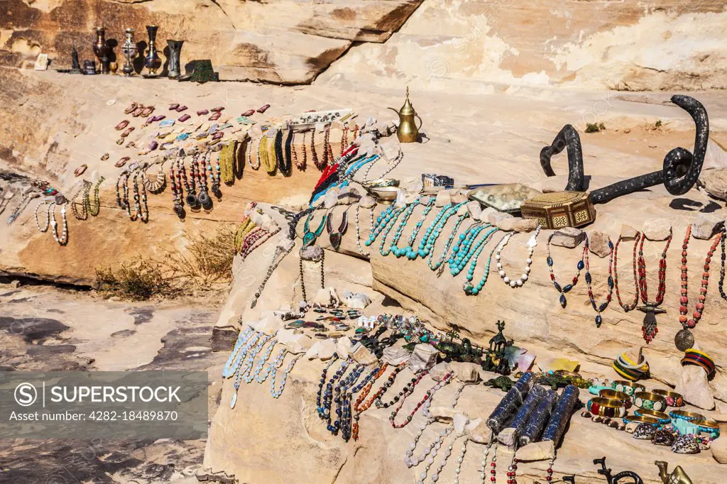 Tourist souvenirs on display in Siq Al-Barid or Little Petra in Jordan.