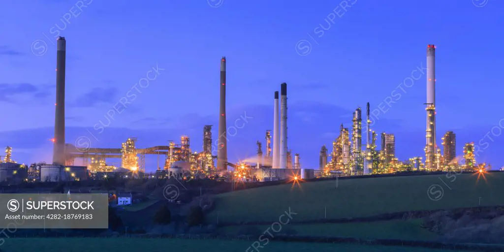 Oil Refinery at Rhoscrowther on Milford Haven Waterway at twilight.