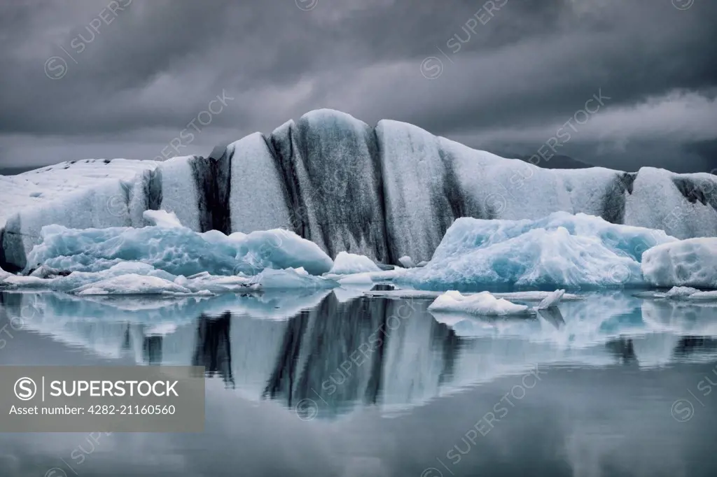 Icebergs in Jokulsarlon Glacial lagoon under a moody sky.