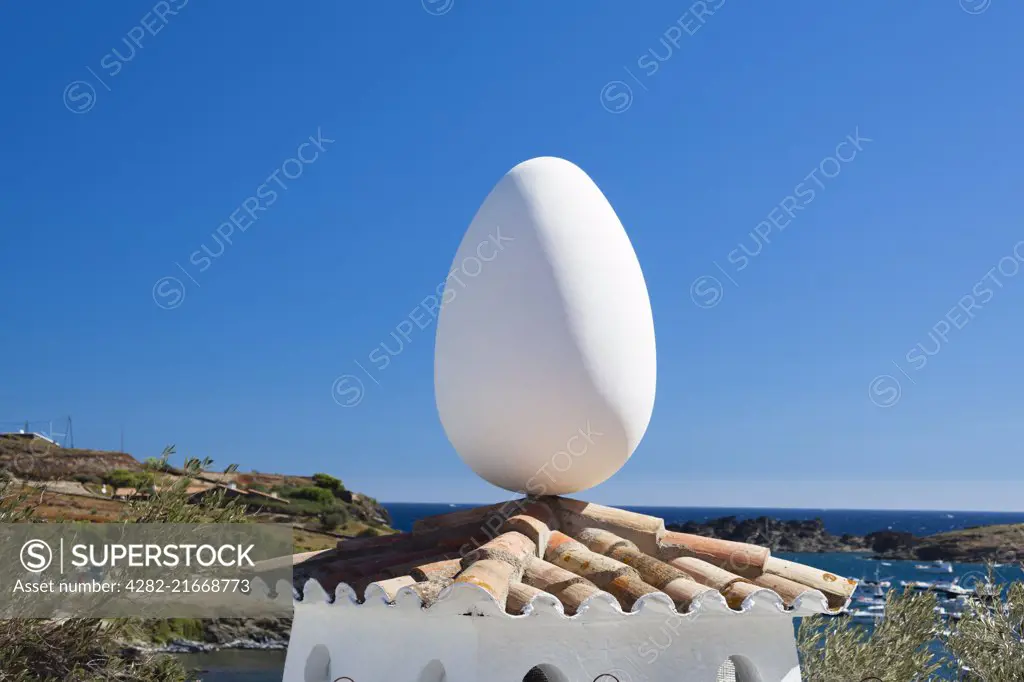 A giant egg sculpture by Salvador Dali overlooks the Costa Brava coast.