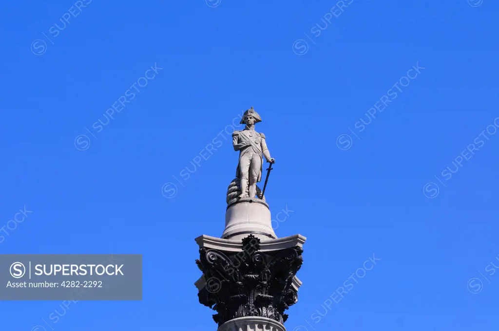 England, London, Trafalgar Square. The sandstone statue of Admiral Nelson on top of Nelson's Column in Trafalgar Square.