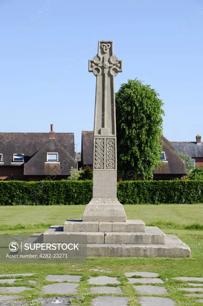 England, Hampshire, Romsey. Celtic Cross gravestone in the grounds of Romsey Abbey.