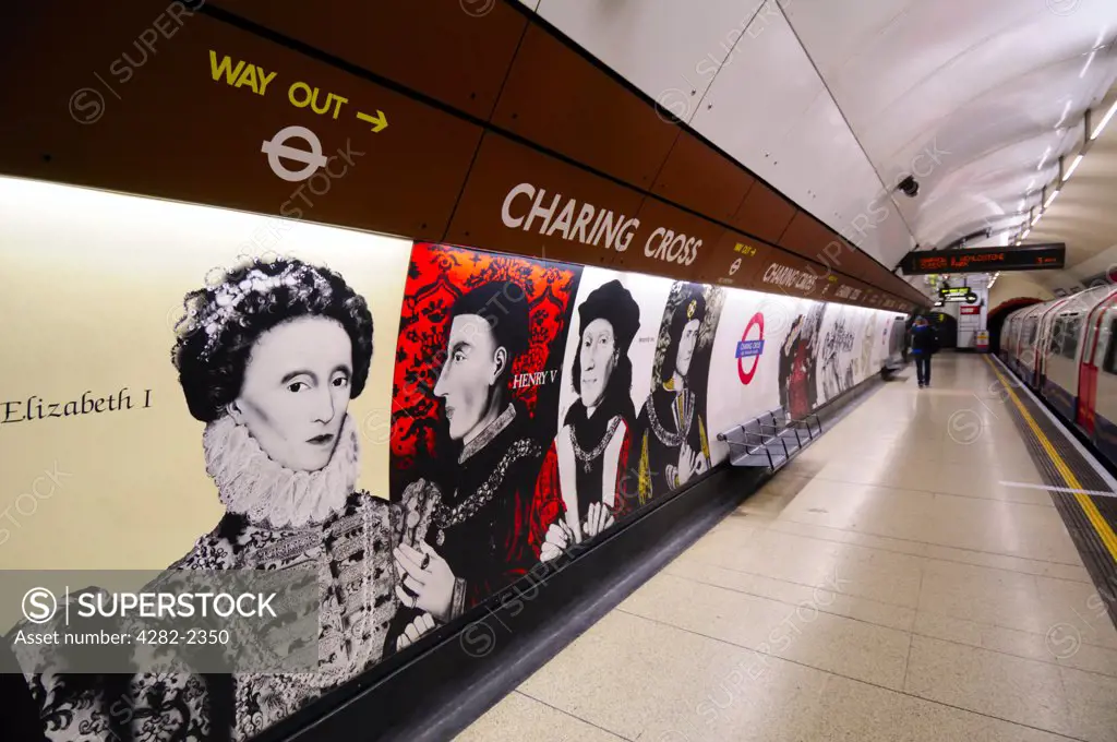 England, London, Charing Cross. Pictures of British monarchs adorn the walls of a platform on the Bakerloo line at Charing Cross Underground Station.