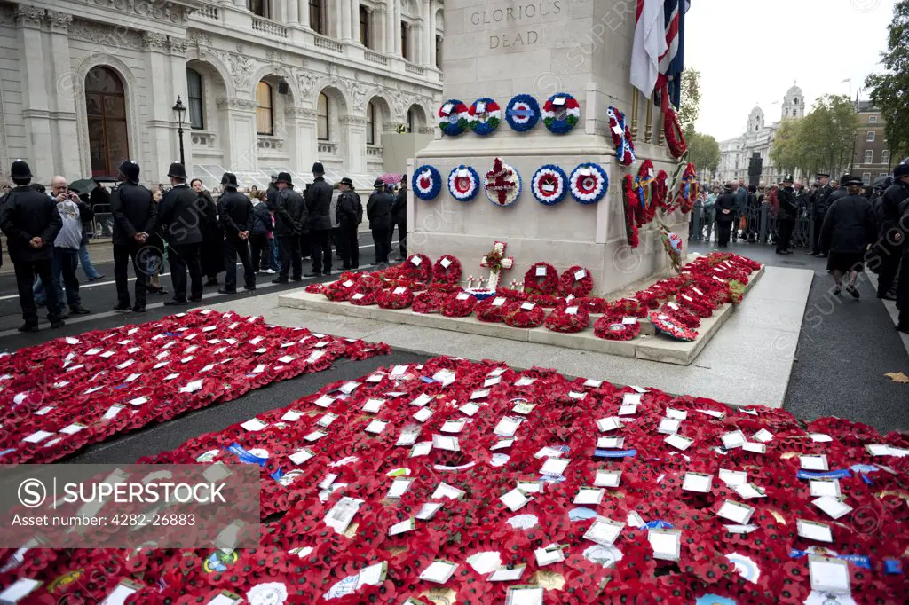 England, London, Whitehall. Metropolitan Police officers form a cordon around the Cenotaph in Whitehall after the Remembrance Day Parade.